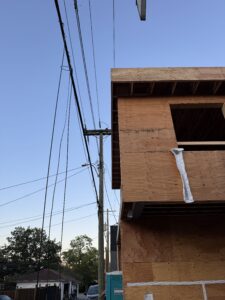 A new laneway home sits within the 3m clearance requirement to high voltage overhead conductors